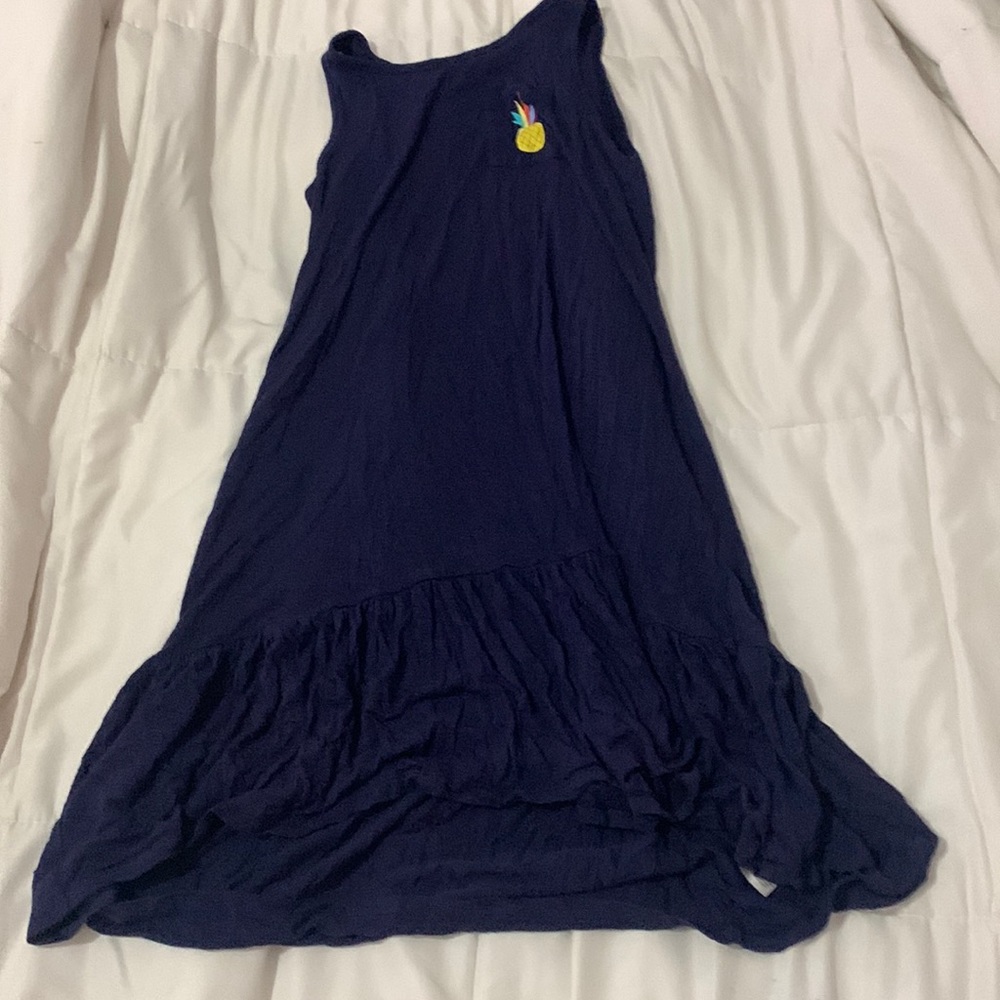 A kids navy blue pinapple dress.